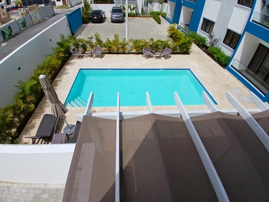 Apartamento en Costa Cana, Bávaro de 2 habitaciones con 2 baños y 1 parqueo en 3er nivel con mantenimiento incluido - Imagen 7