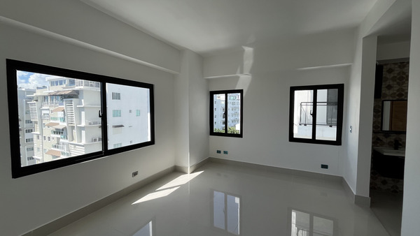 Apartamento en Ensanche Naco, Santo Domingo D.N. con 1 habitación, 1 baño, 1 parqueo en 7mo nivel de 56 mts² con mantenimiento incluido - Imagen 5