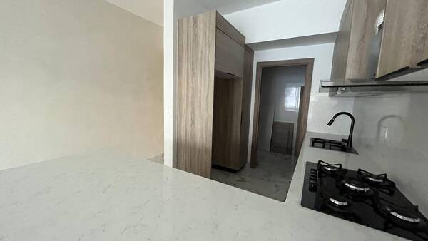 Apartamento en La Feria, Santo Domingo D.N. con 2 habitaciones, 2 baños, 2 parqueos en 4to nivel de 110 mts² con mantenimiento incluido - Imagen 2