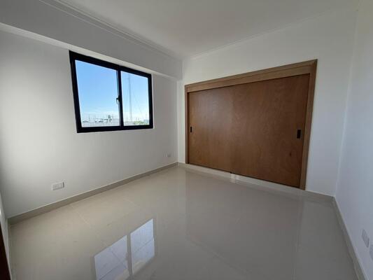 Apartamento en Alma Rosa I, Santo Domingo Este con 2 habitaciones, 1 parqueo con mantenimiento incluido - Imagen 5