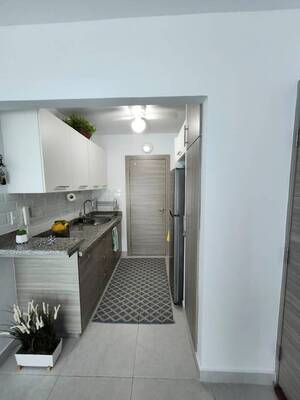 Apartamento en Pueblo Bávaro, Bávaro con 2 habitaciones, 2 baños, 1 parqueo en 1er nivel de 61 mts² con mantenimiento incluido - Imagen 5