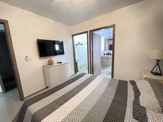 Apartamento en Epic Residences, Bávaro con 2 habitaciones, 2 baños, 1 parqueo en 2do nivel de 74 mts² con mantenimiento incluido - Imagen 4