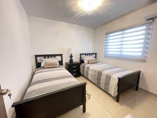 Apartamento en Epic Residences, Bávaro con 2 habitaciones, 2 baños, 1 parqueo en 2do nivel de 74 mts² con mantenimiento incluido - Imagen 5